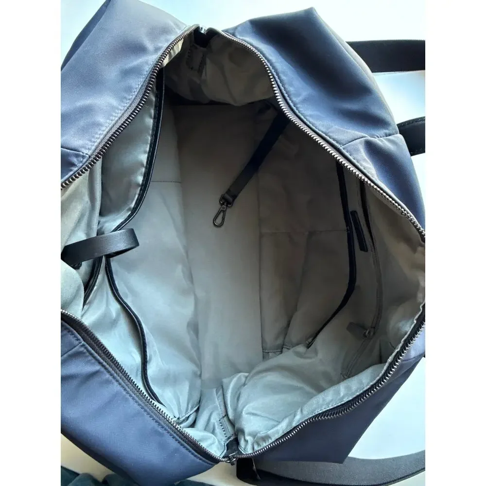 AWAY Tick Tick Boom Travel Duffel Bag in Navy & Black Vacation Durable Large